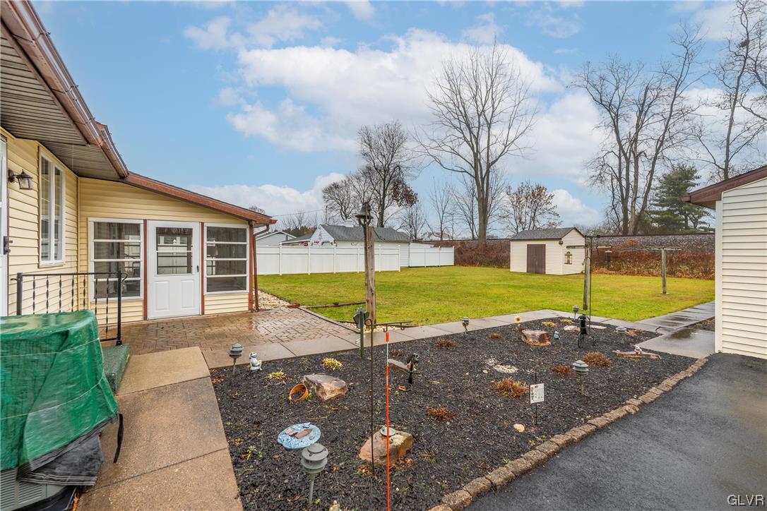 1685 Trexlertown Road Lower Macungie Township, PA 18062 - Photo 9 of 26 a view of a house with a backyard