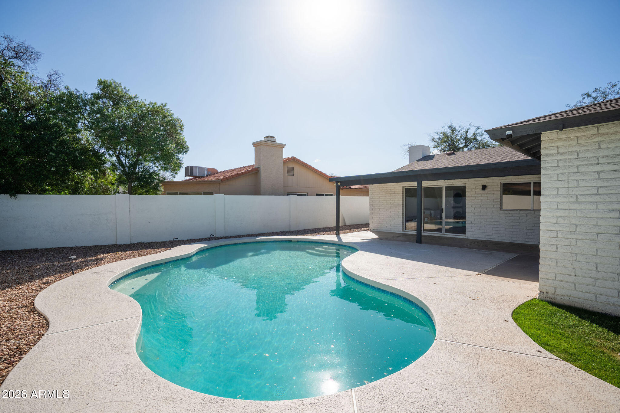 2719 South Playa Mesa, AZ 85202 - Photo 4 of 6 a view of a house with a backyard