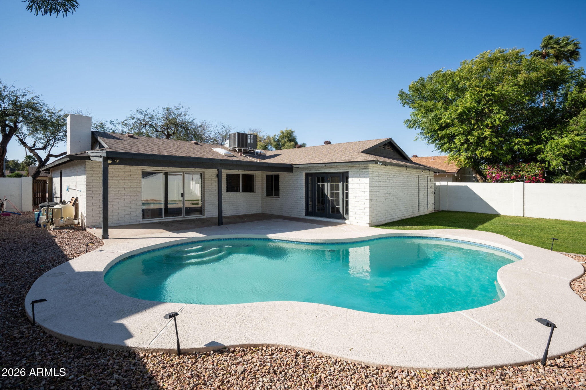2719 South Playa Mesa, AZ 85202 - Photo 5 of 6 a view of a house with swimming pool