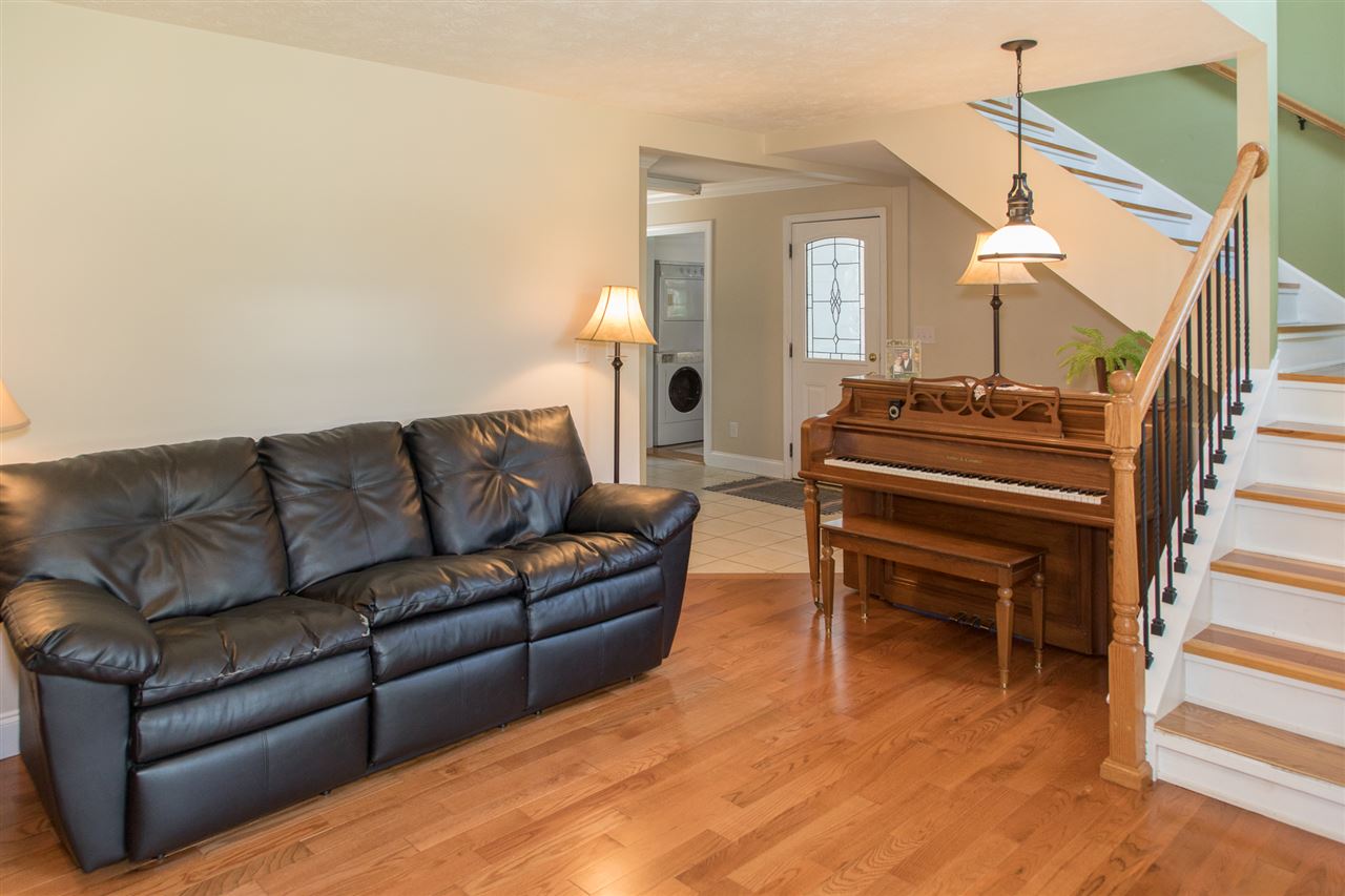 2888 Kerns Road Dayton, VA 22821 - Photo 16 of 49 a living room with furniture a fireplace and a chandelier