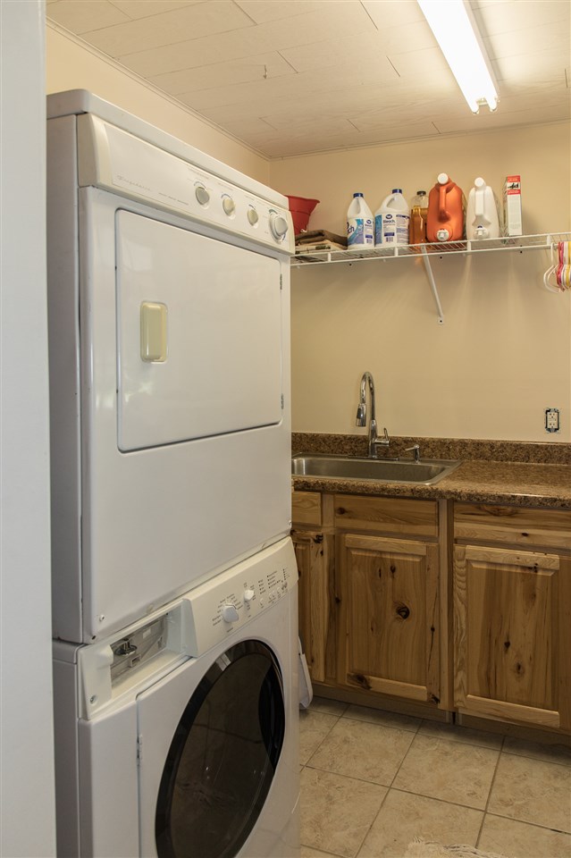 2888 Kerns Road Dayton, VA 22821 - Photo 19 of 49 a kitchen with a refrigerator and a sink