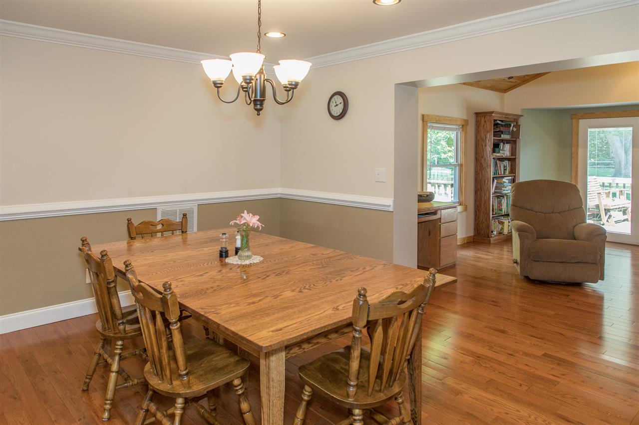 2888 Kerns Road Dayton, VA 22821 - Photo 23 of 49 a view of a dining room with furniture and wooden floor