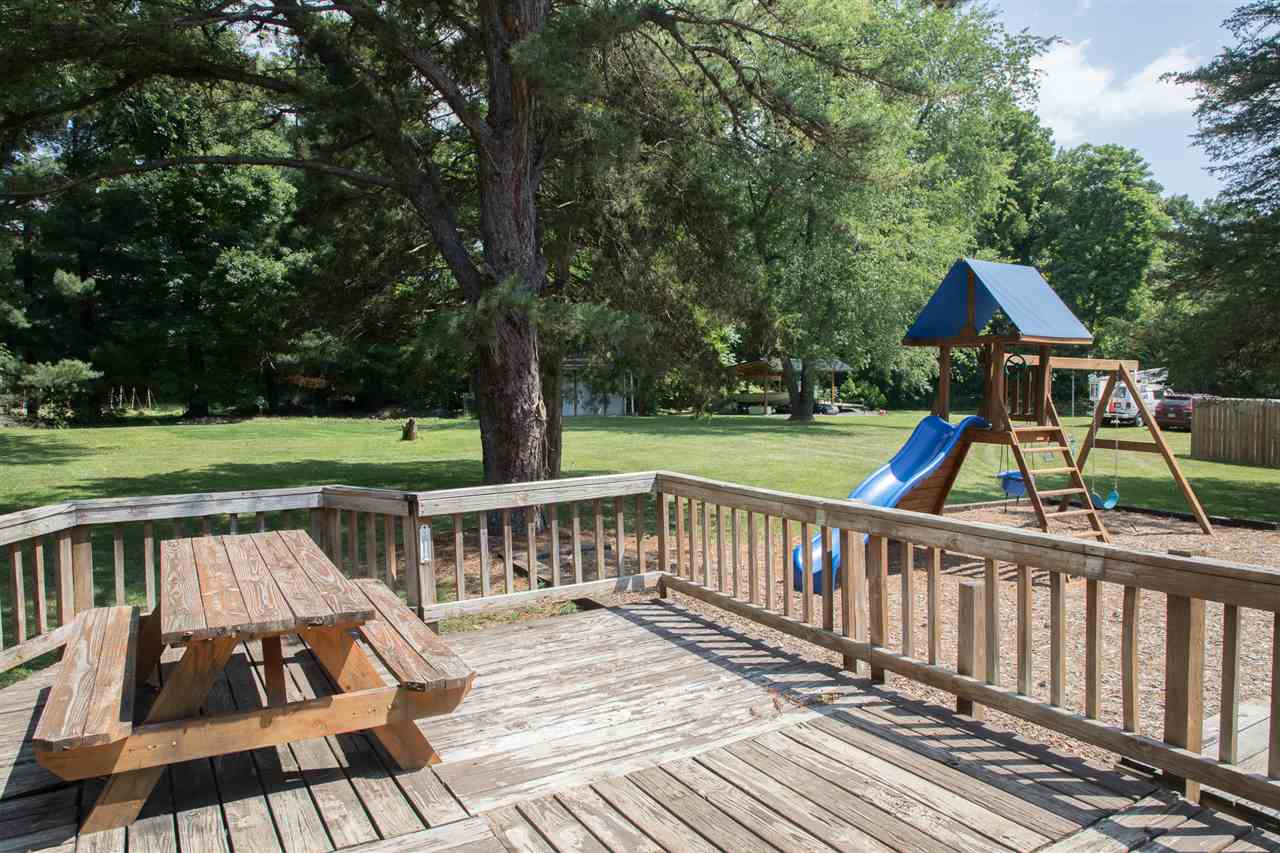 2888 Kerns Road Dayton, VA 22821 - Photo 29 of 49 a view of deck with wooden floor barbeque oven and trees