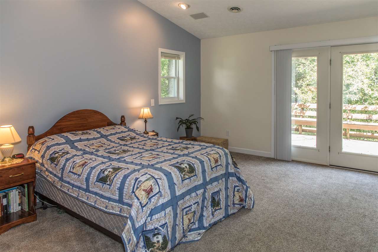 2888 Kerns Road Dayton, VA 22821 - Photo 43 of 49 a bedroom with a bed lamp and a window