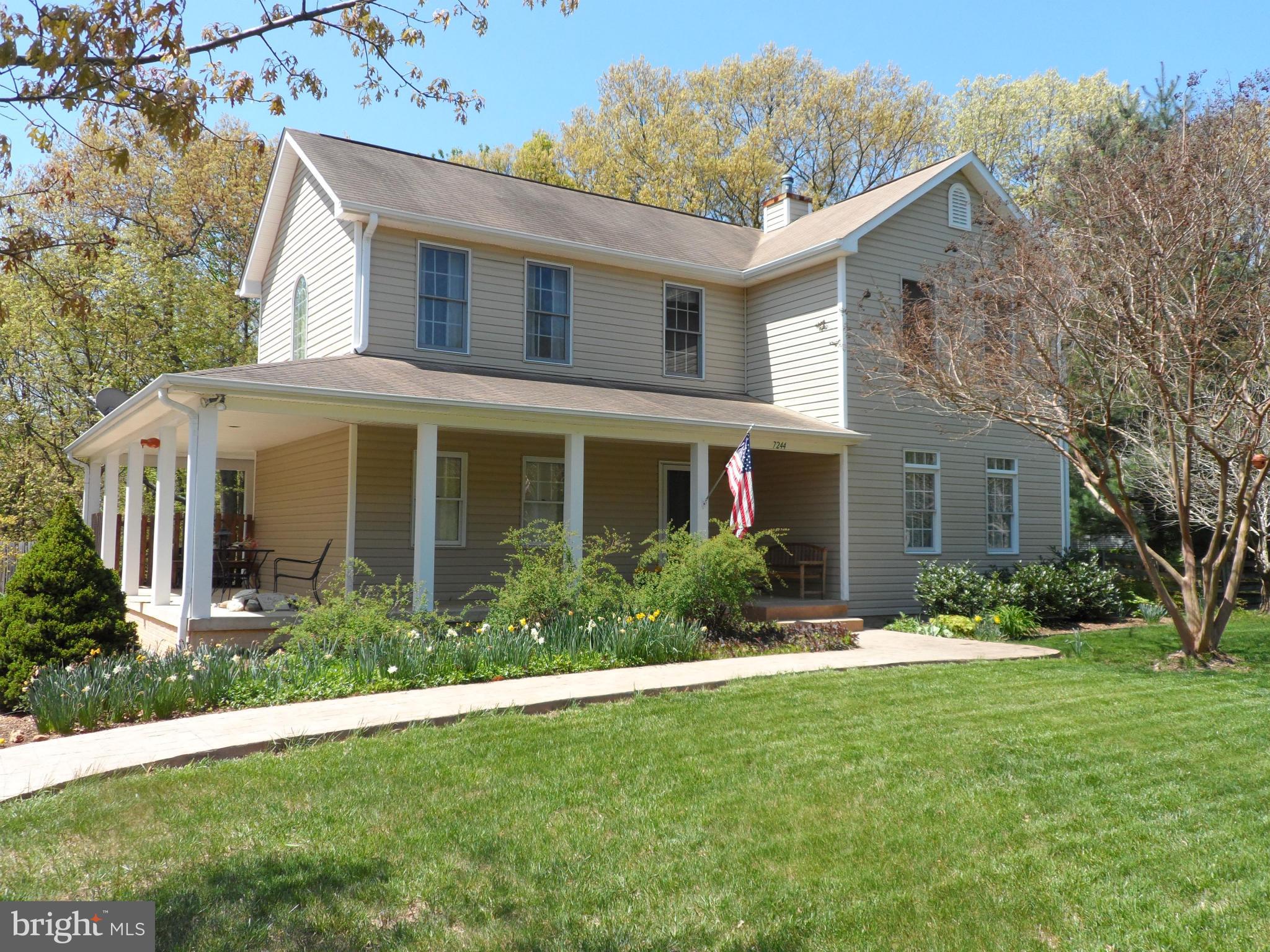 7244 Peppermill Road King George, VA 22485 - Photo 1 of 30 a front view of house with yard and green space