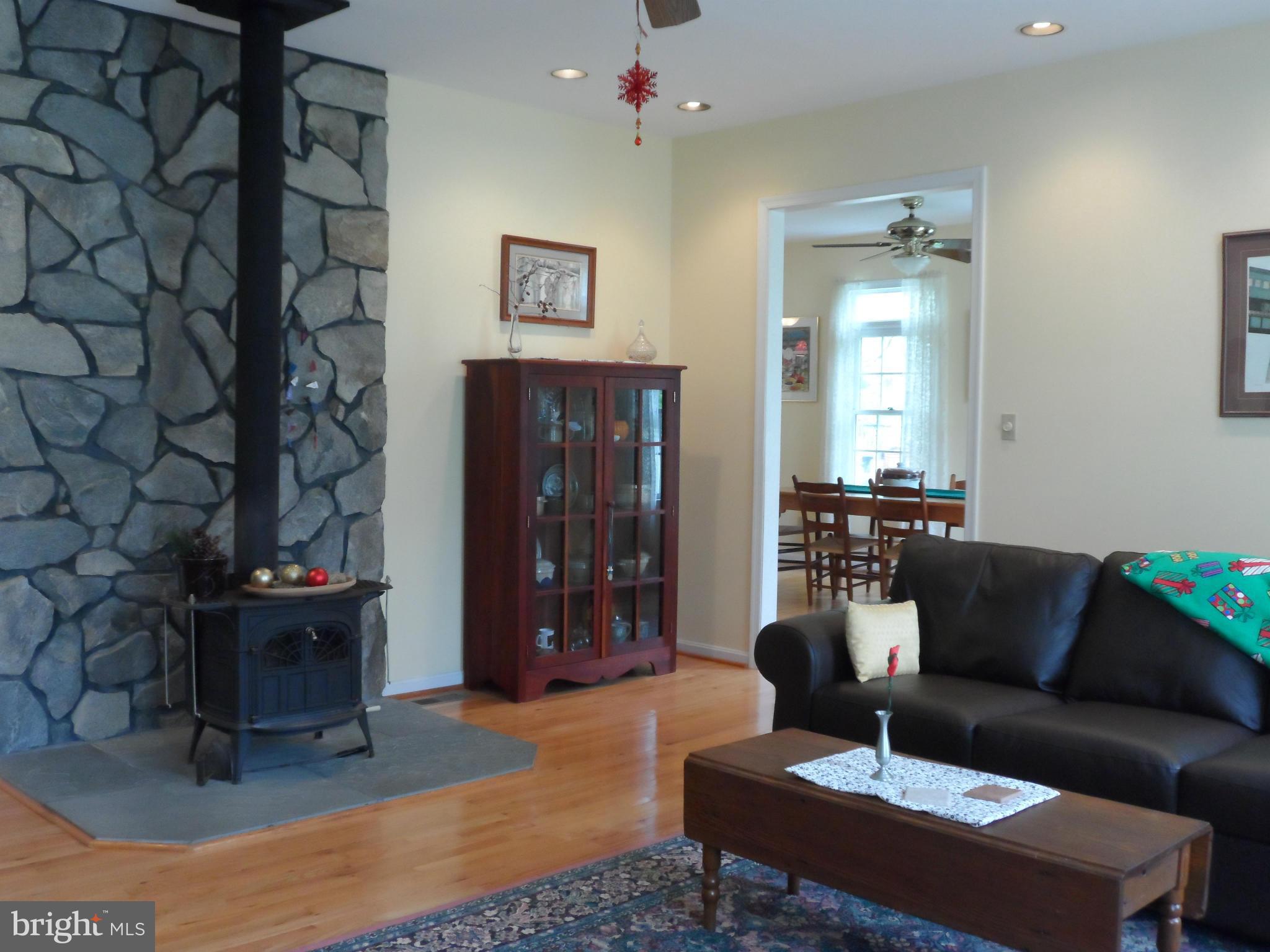 7244 Peppermill Road King George, VA 22485 - Photo 14 of 30 a living room with furniture and a fireplace