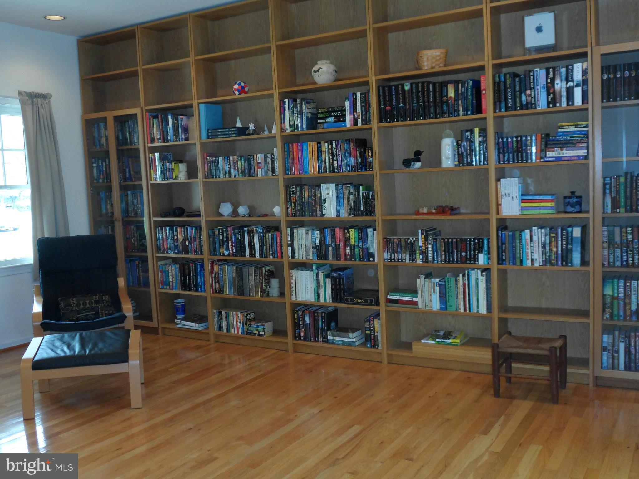 7244 Peppermill Road King George, VA 22485 - Photo 21 of 30 a view of a workspace with bookshelf and a window