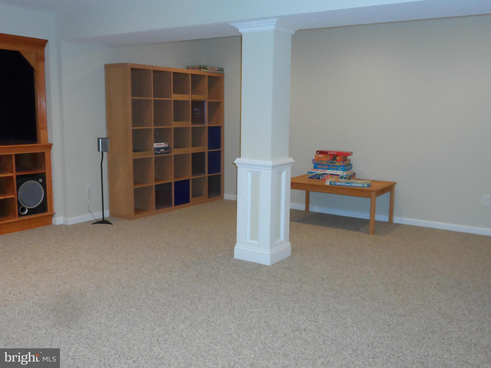 7244 Peppermill Road King George, VA 22485 - Photo 28 of 30 a view of an empty room with furniture and wooden floor