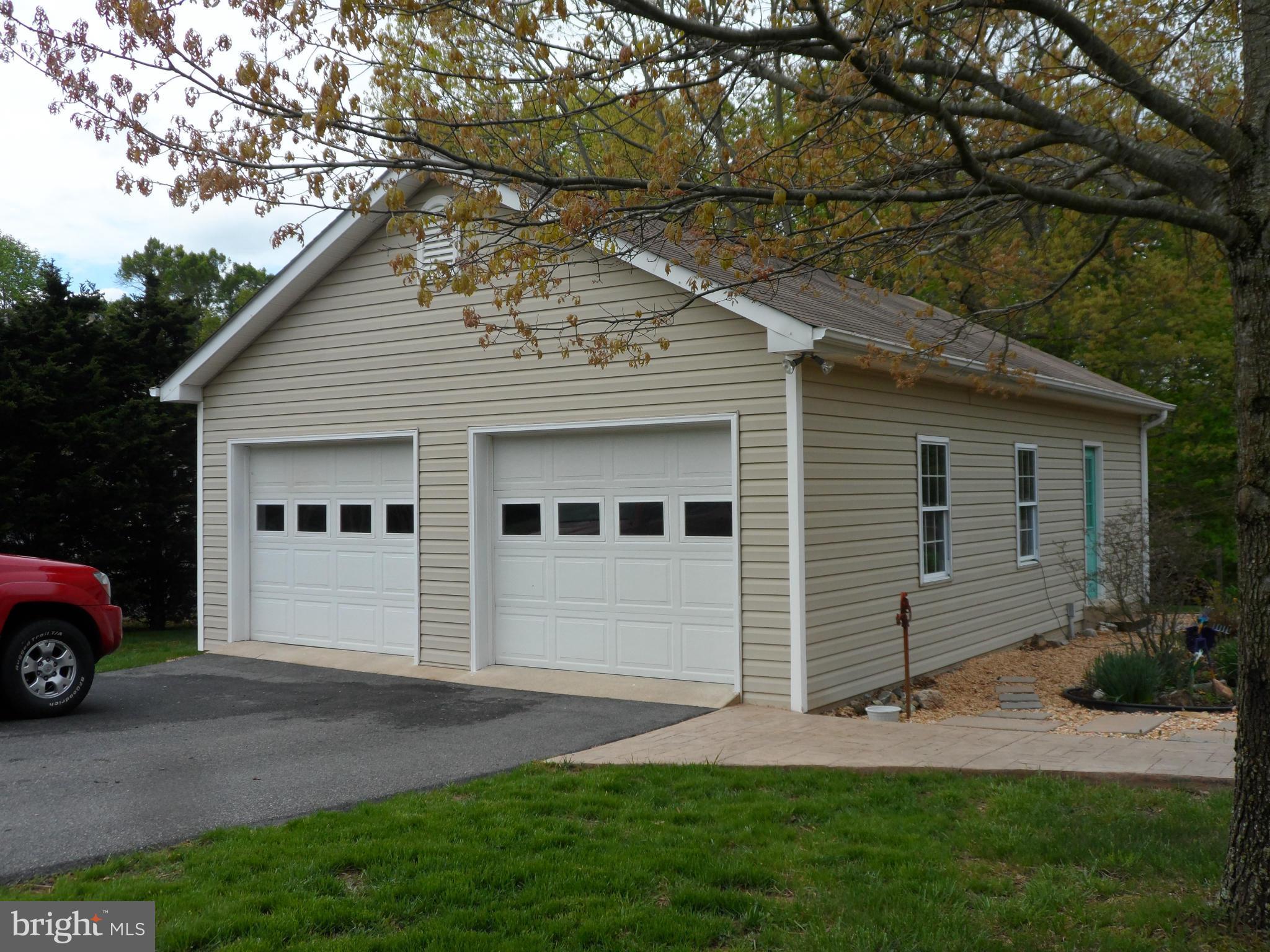 7244 Peppermill Road King George, VA 22485 - Photo 5 of 30 a view of a house with a garden