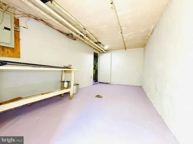 a view of a porch with a wooden fence