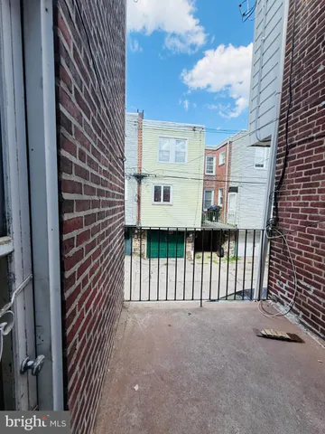 a view of a balcony with an outdoor space