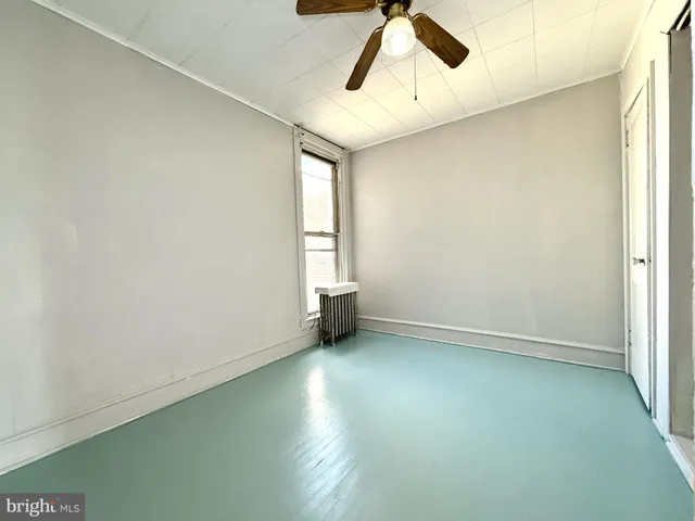 a view of a room with an empty space