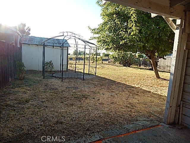 818 South Tehama Street Willows, CA 95988 - Photo 2 of 12 a view of a backyard of the house