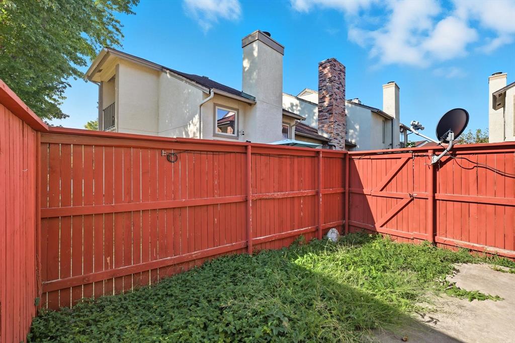 910 Turtle Cove, Unit 148 Irving, TX 75060 - Photo 28 of 33 a view of a garage with a sink