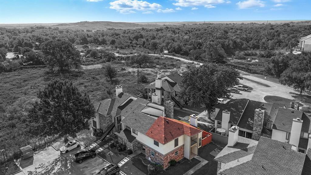 910 Turtle Cove, Unit 148 Irving, TX 75060 - Photo 33 of 33 an aerial view of a house with a yard