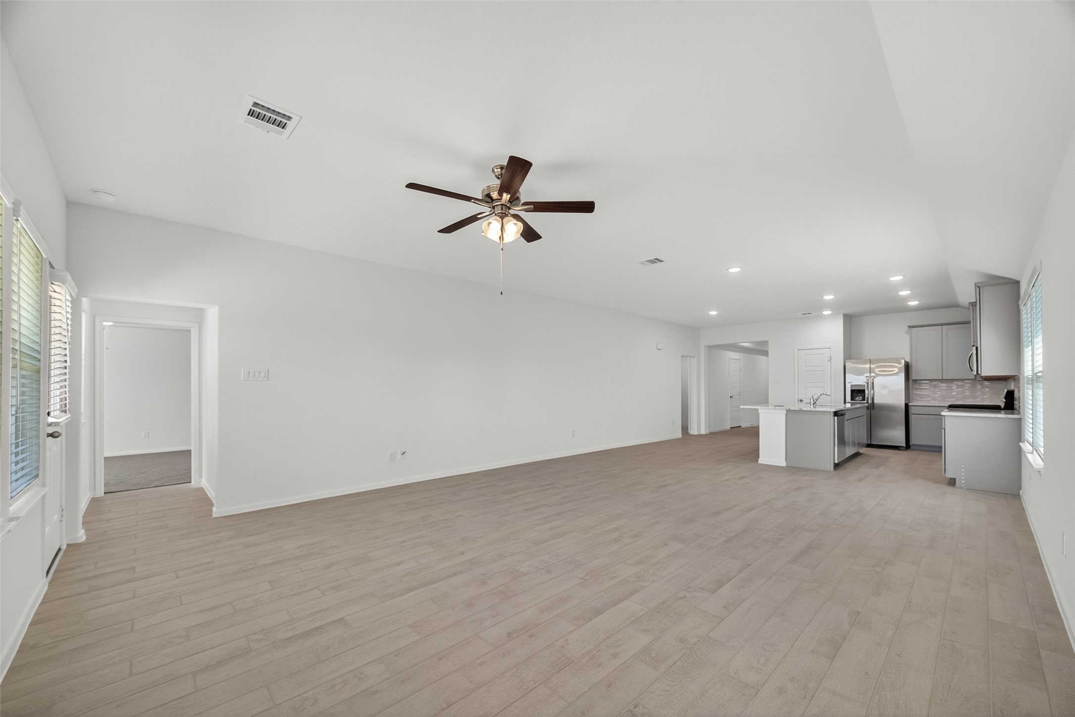2111 Spring Hollow Drive Baytown, TX 77521 - Photo 14 of 42 a view of a livingroom with a ceiling fan