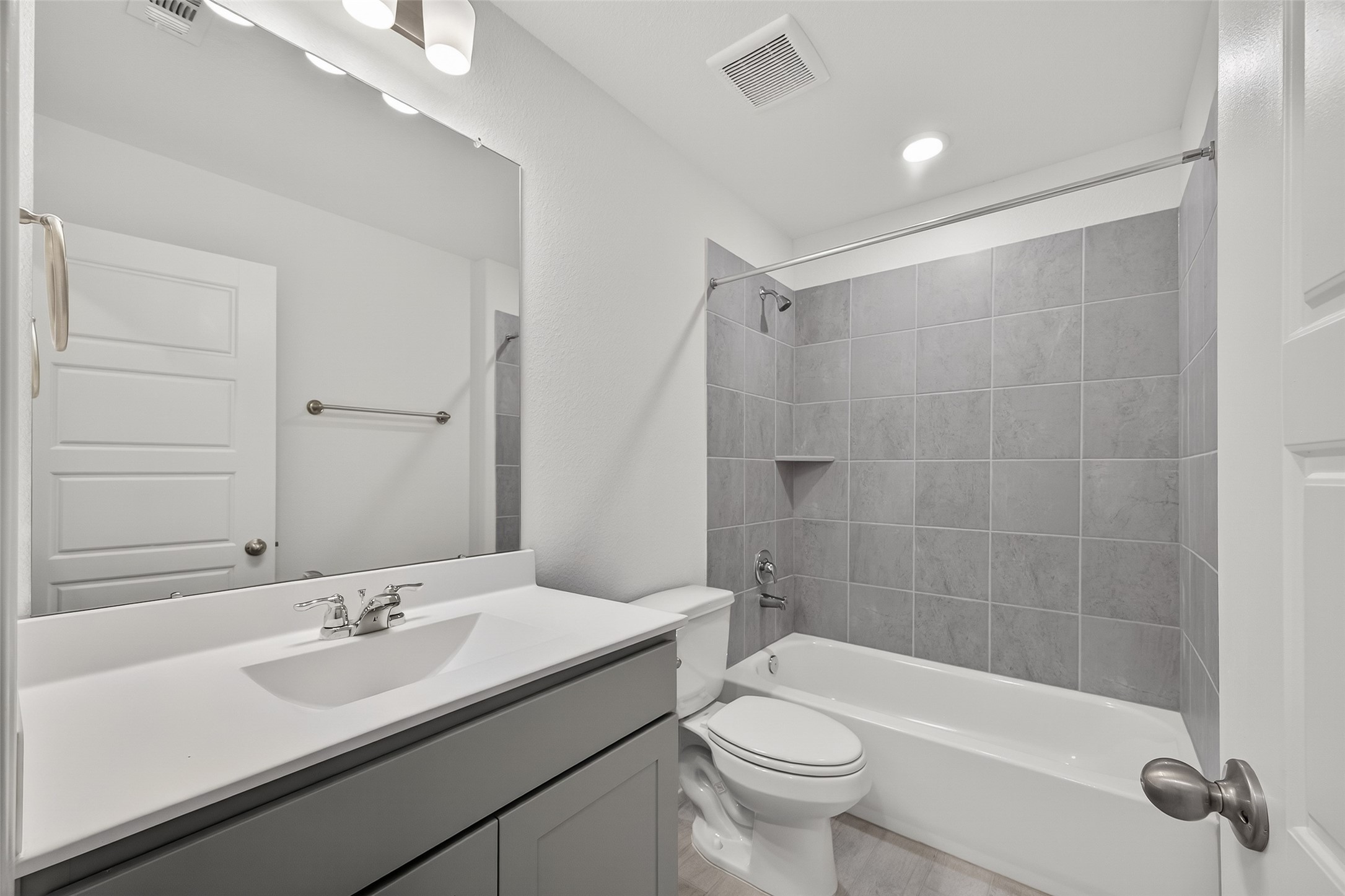 2111 Spring Hollow Drive Baytown, TX 77521 - Photo 25 of 42 a bathroom with a sink a toilet and shower