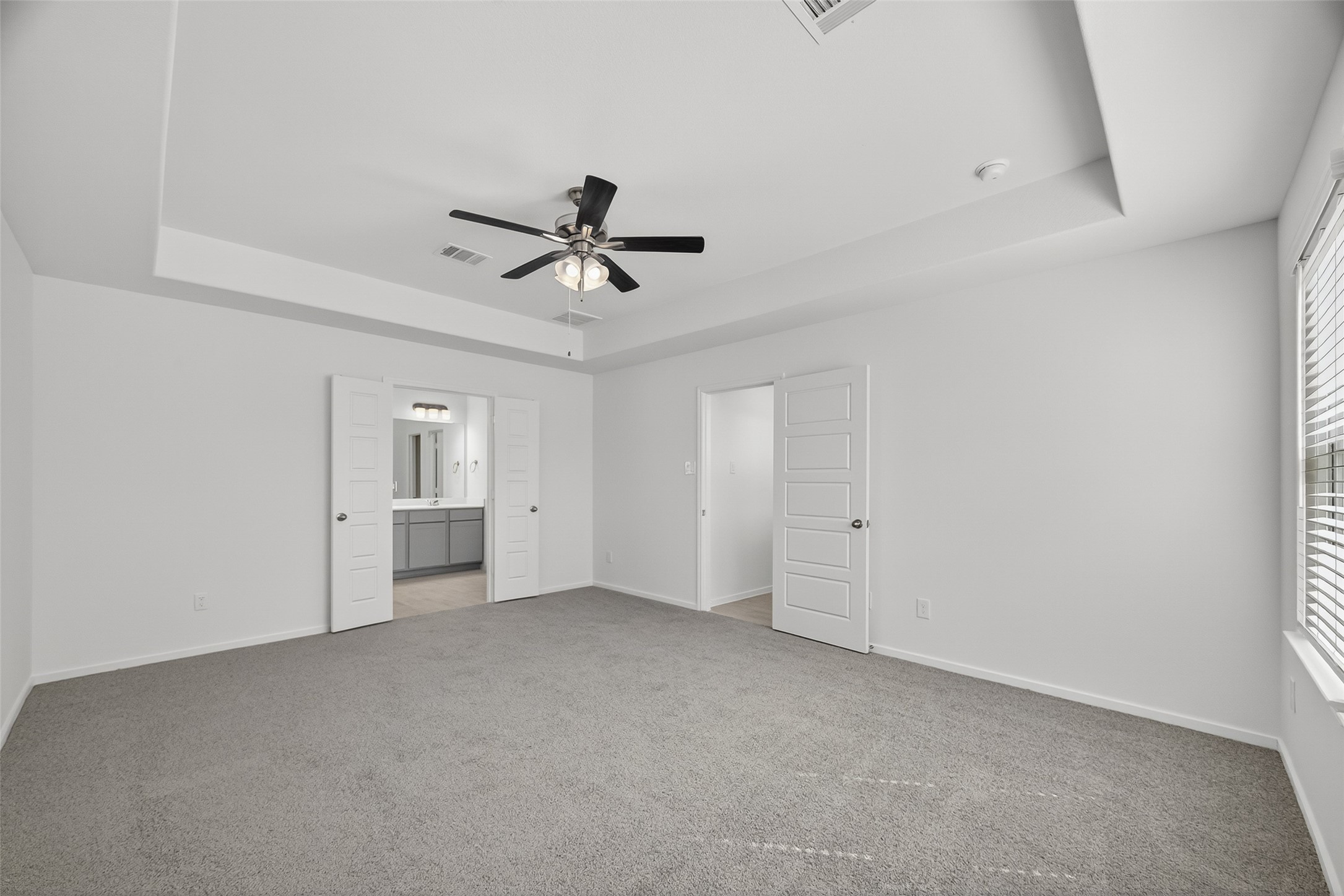 2111 Spring Hollow Drive Baytown, TX 77521 - Photo 31 of 42 a view of a livingroom with a ceiling fan and wooden floor
