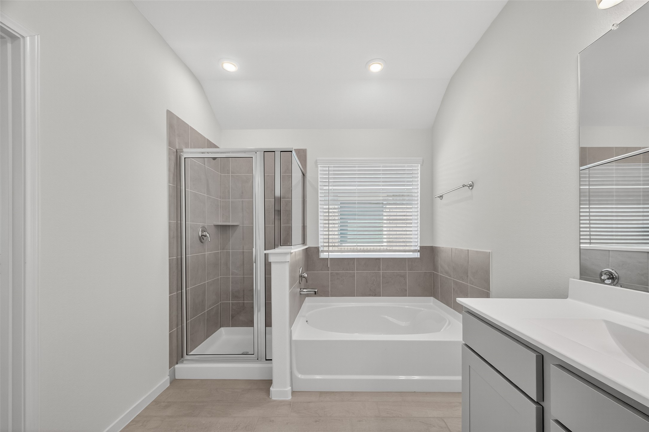2111 Spring Hollow Drive Baytown, TX 77521 - Photo 35 of 42 a bathroom with a bathtub and a sink