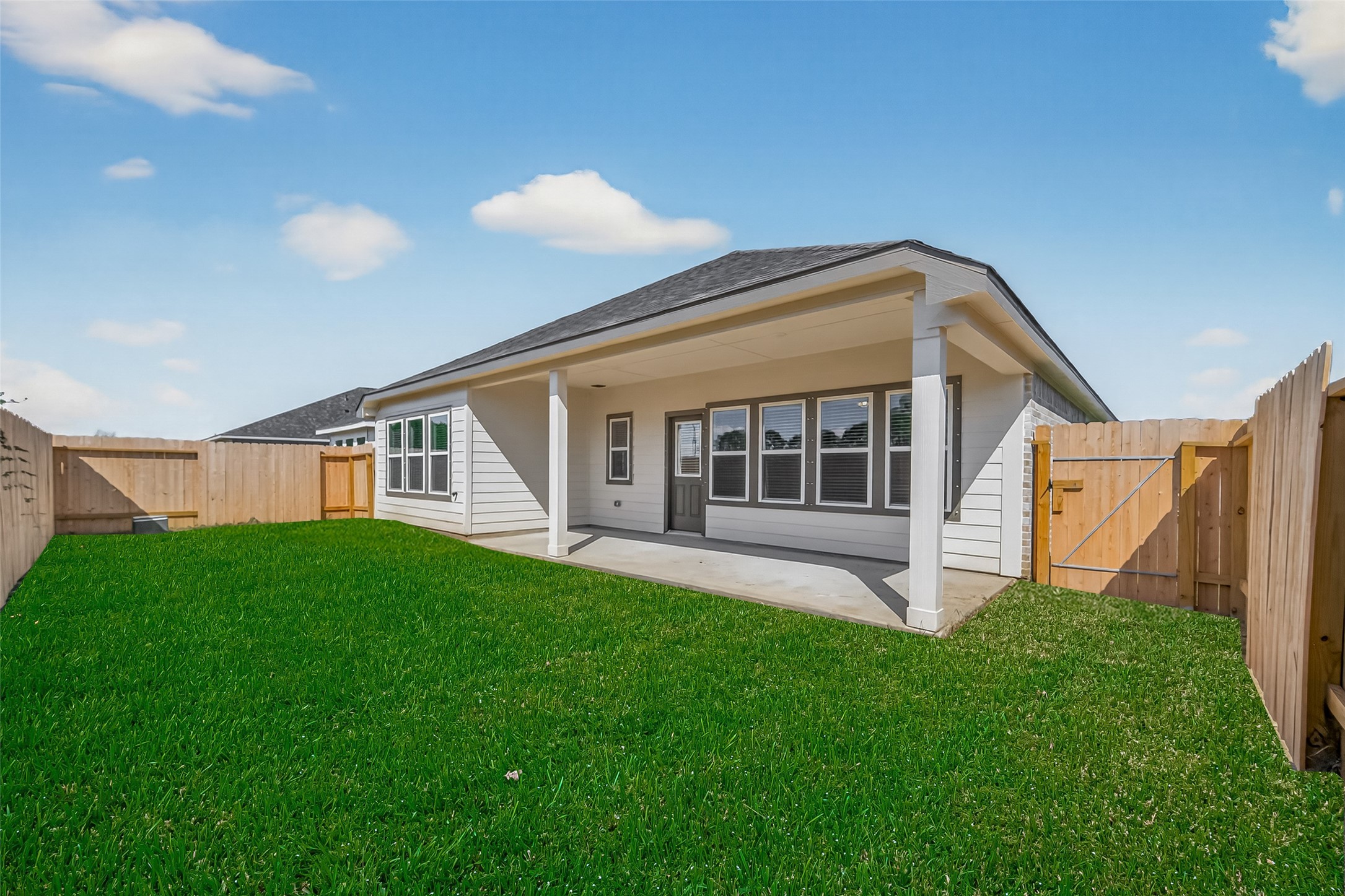 2111 Spring Hollow Drive Baytown, TX 77521 - Photo 38 of 42 a view of a house with backyard