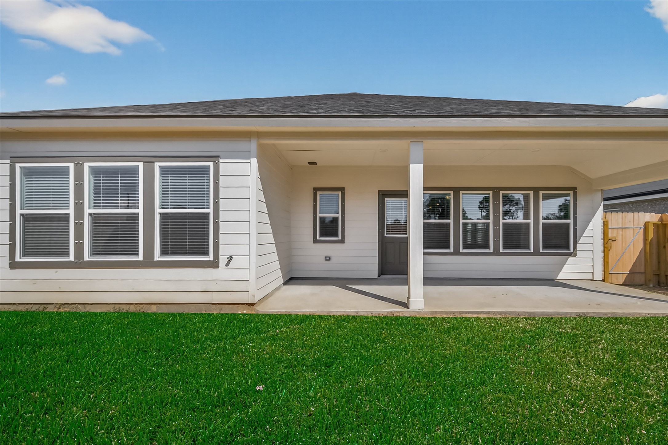 2111 Spring Hollow Drive Baytown, TX 77521 - Photo 40 of 42 front view of a house with a yard