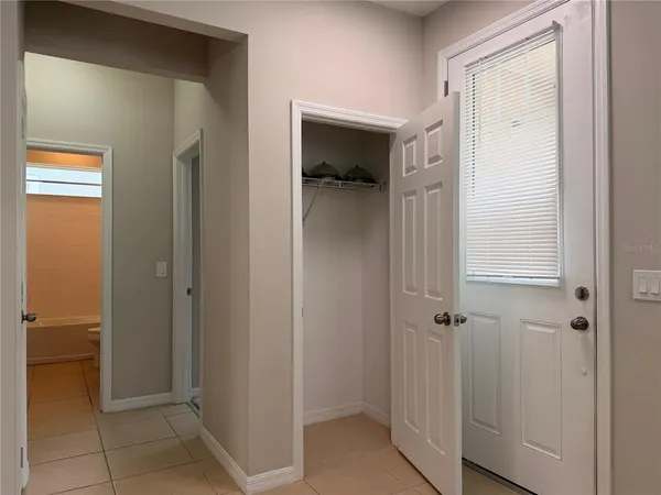 a view of a bathroom from a hallway
