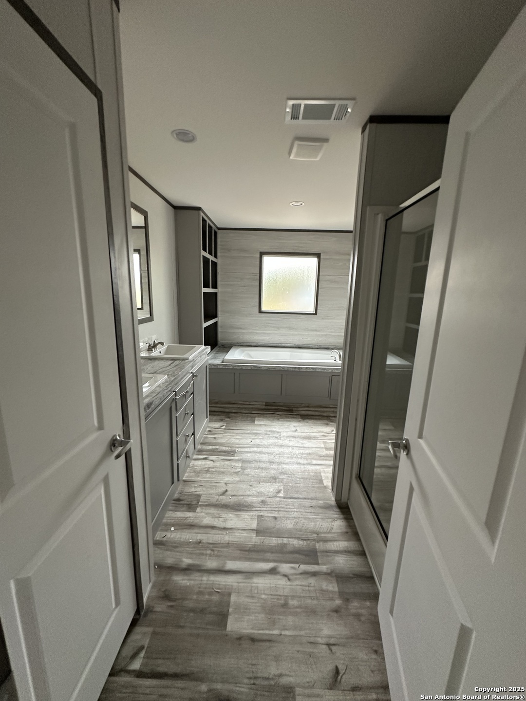 719 North Houston Street Sabinal, TX 78881 - Photo 4 of 7 a view of a hallway view with staircase