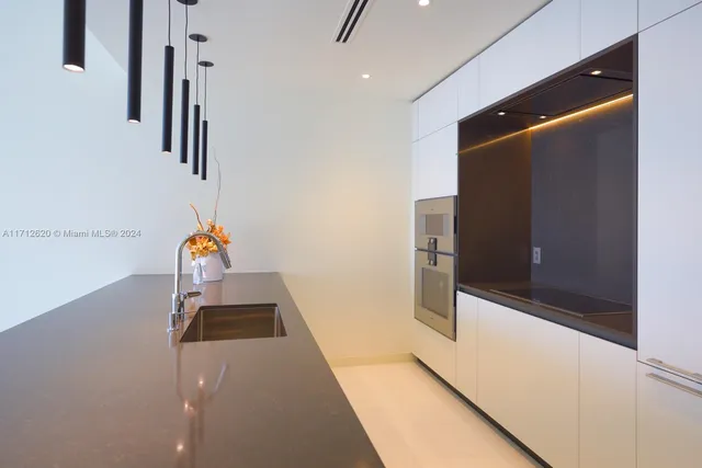 a view of a balcony with a floor to ceiling window