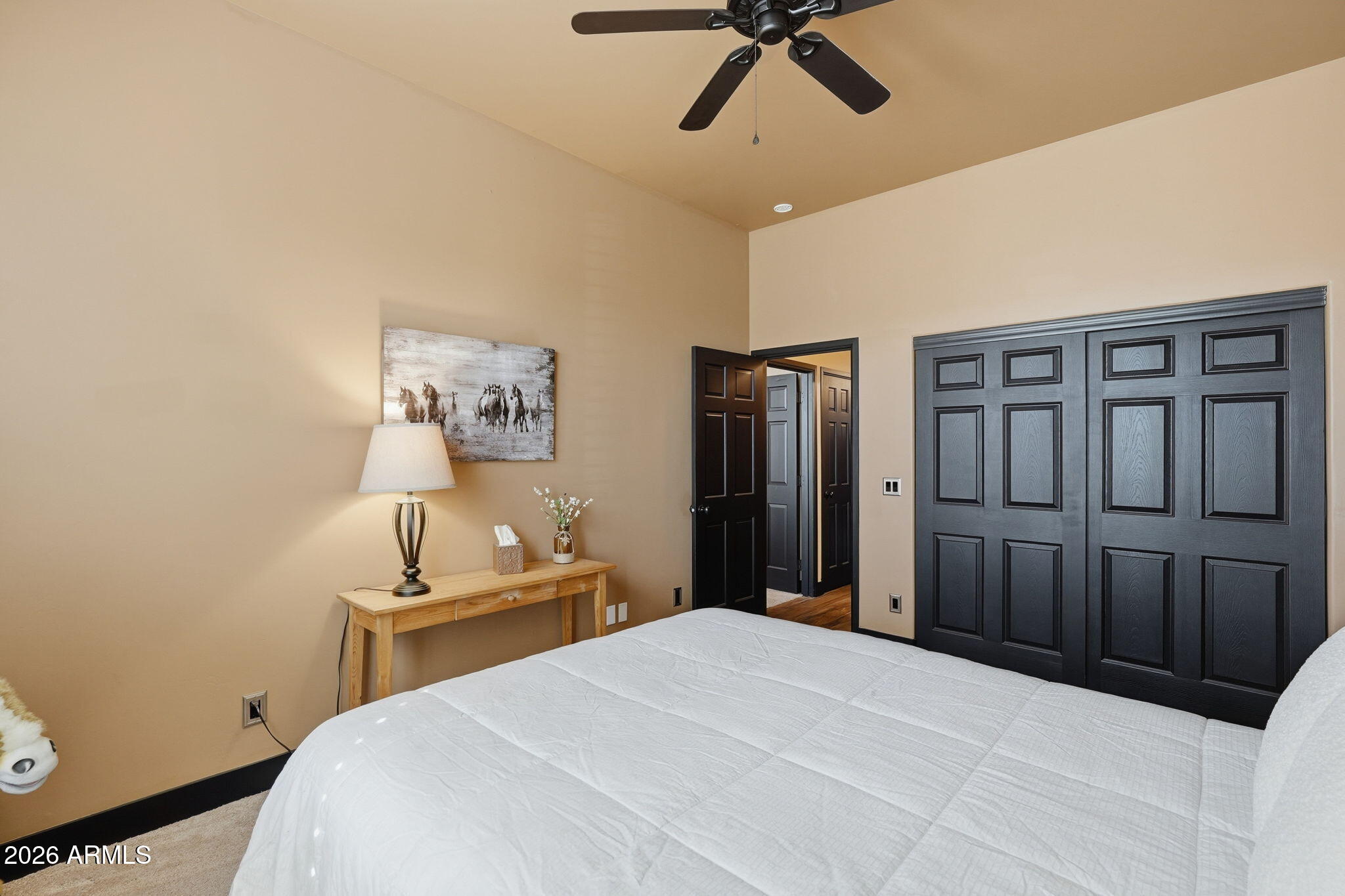 1114 East Carlise Road Phoenix, AZ 85086 - Photo 37 of 53 a bedroom with a bed and dresser