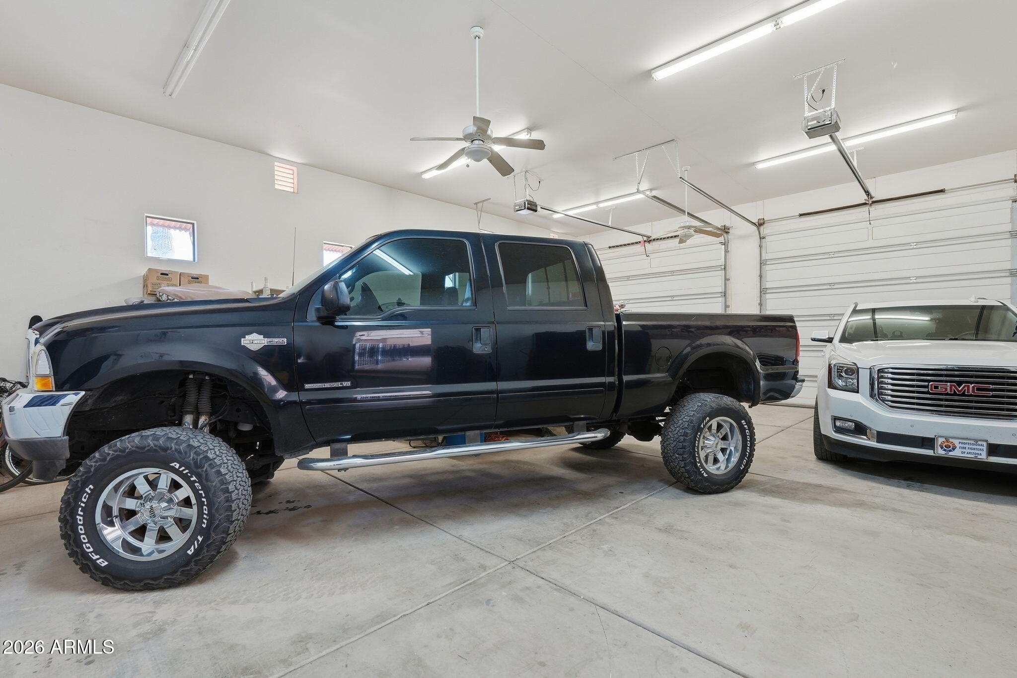 1114 East Carlise Road Phoenix, AZ 85086 - Photo 43 of 53 a car is parked in a garage