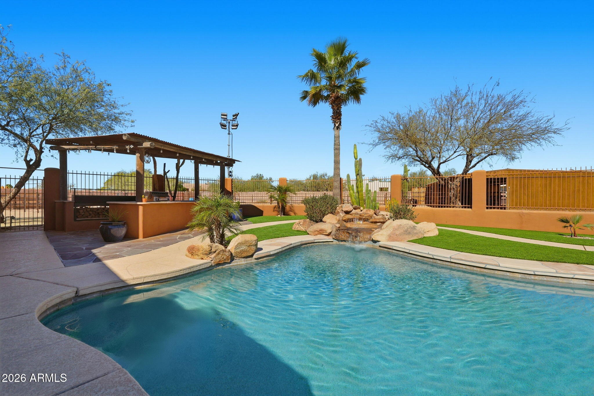 1114 East Carlise Road Phoenix, AZ 85086 - Photo 48 of 53 a view of a house with pool and chairs