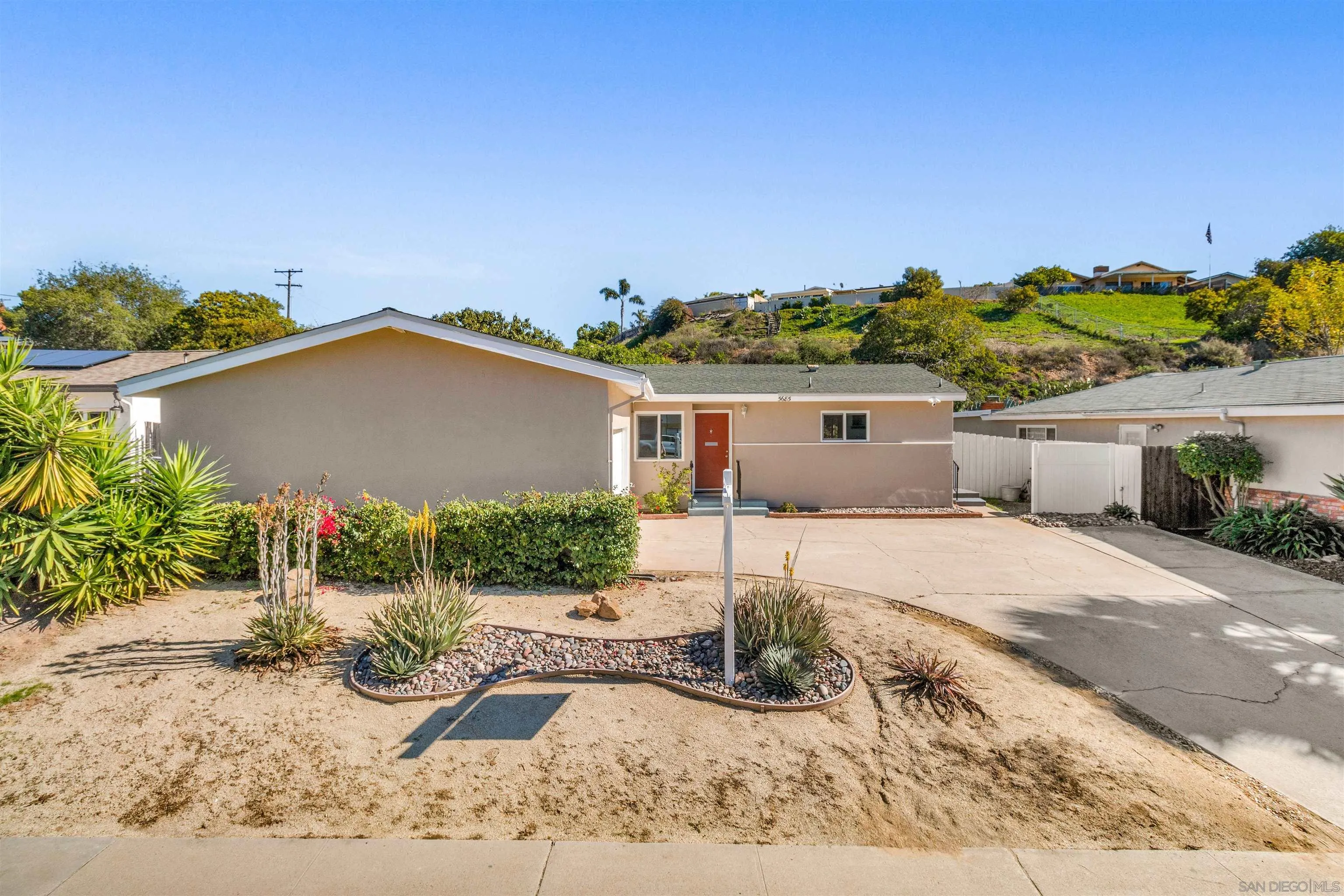 5685 Jackson Drive La Mesa, CA 91942 - Photo 1 of 24 front view of a house with a patio