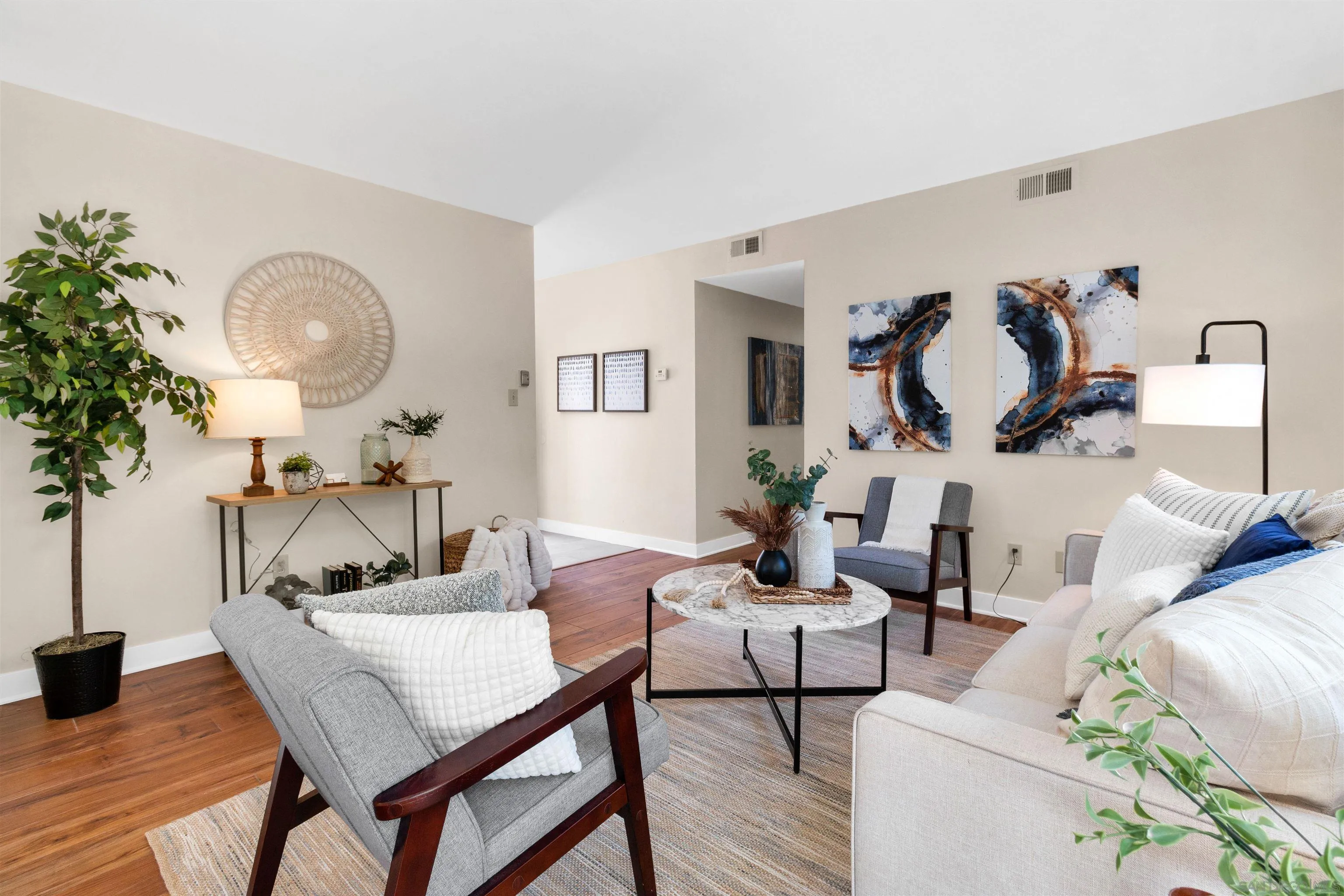 5685 Jackson Drive La Mesa, CA 91942 - Photo 5 of 24 a living room with furniture and wooden floor