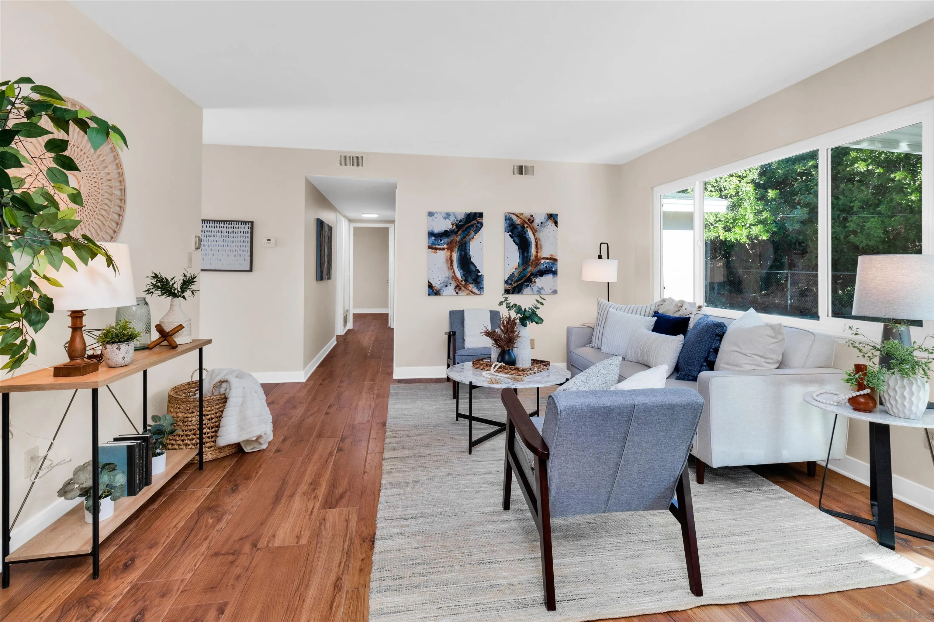 5685 Jackson Drive La Mesa, CA 91942 - Photo 6 of 24 a living room with furniture and a wooden floor