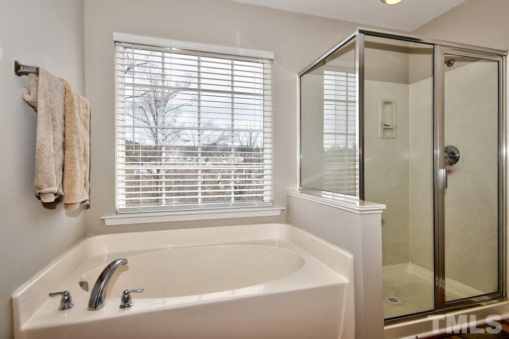 7754 San Gabriel Street Raleigh, NC 27613 - Photo 19 of 25 Soak into your garden tub and enjoy a good book and glass of wine!