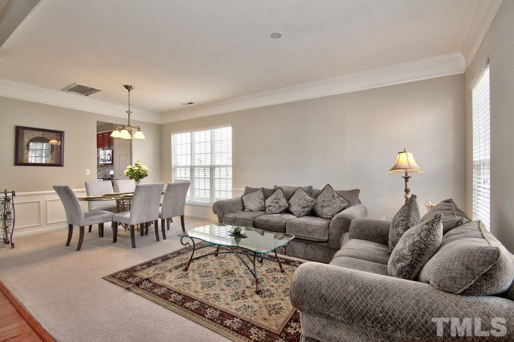 7754 San Gabriel Street Raleigh, NC 27613 - Photo 6 of 25 Additional view of the living room with high ceilings. Great open concept and flows nicely into the dining room and kitchen.