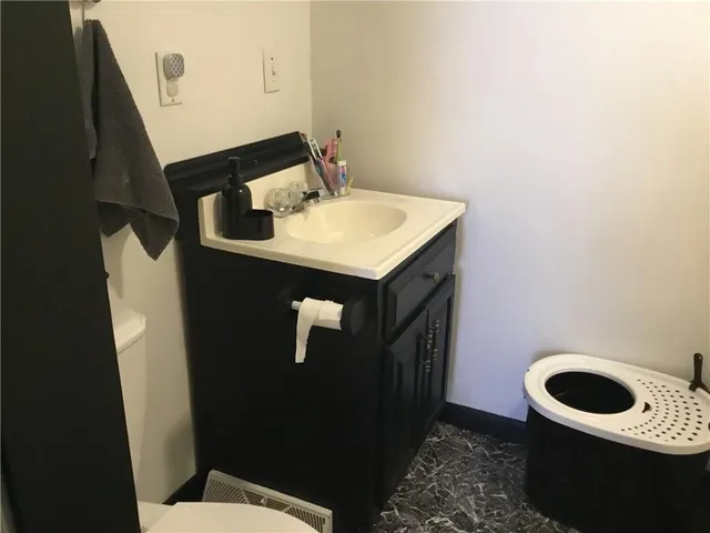 a bathroom with a toilet