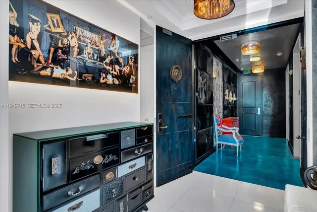 a bathroom with a sink mirror and toilet