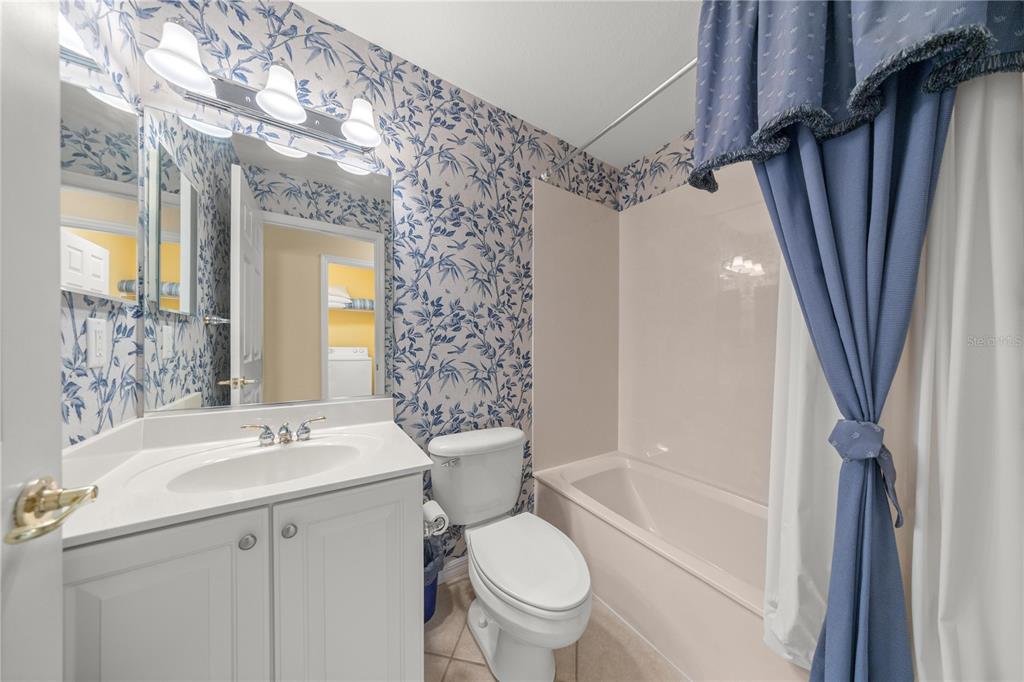 13421 Southeast 92nd Court Road Summerfield, FL 34491 - Photo 19 of 59 a bathroom with a sink toilet and shower