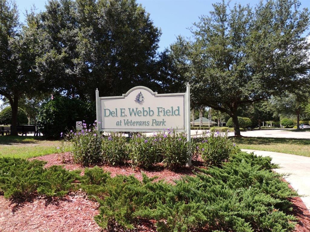 13421 Southeast 92nd Court Road Summerfield, FL 34491 - Photo 46 of 59 a sign on the side of the road