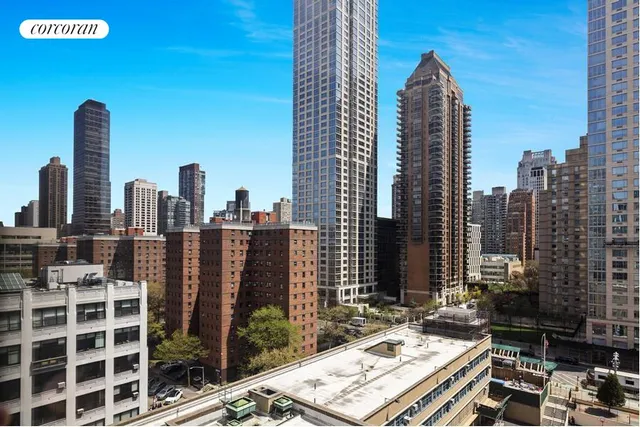 a view of city with tall buildings