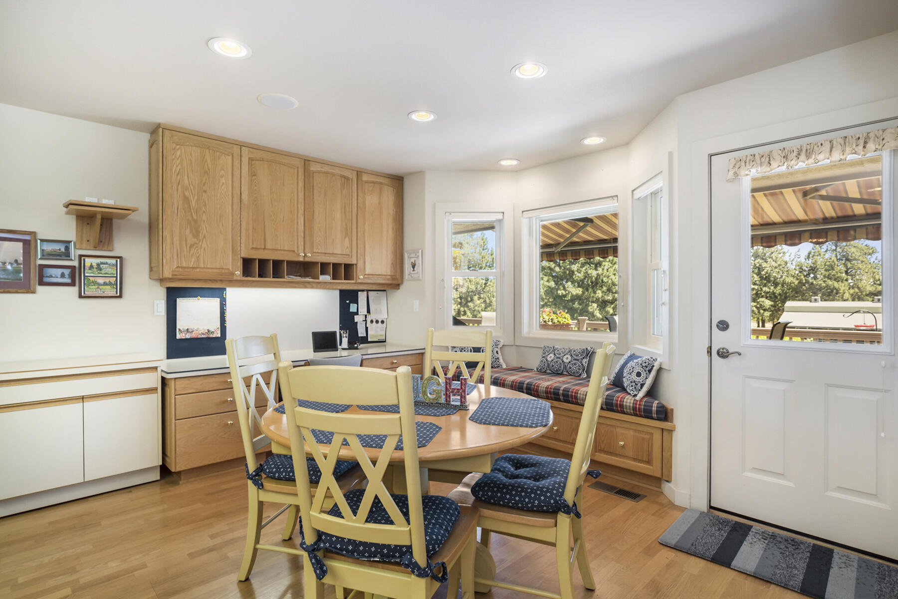 60696 Tekampe Road Bend, OR 97702 - Photo 15 of 61 a view of a dining room with furniture window and outside view