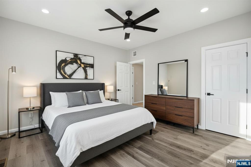 38 Mapes Avenue Newark, NJ 07112 - Photo 3 of 27 a bedroom with bed and window