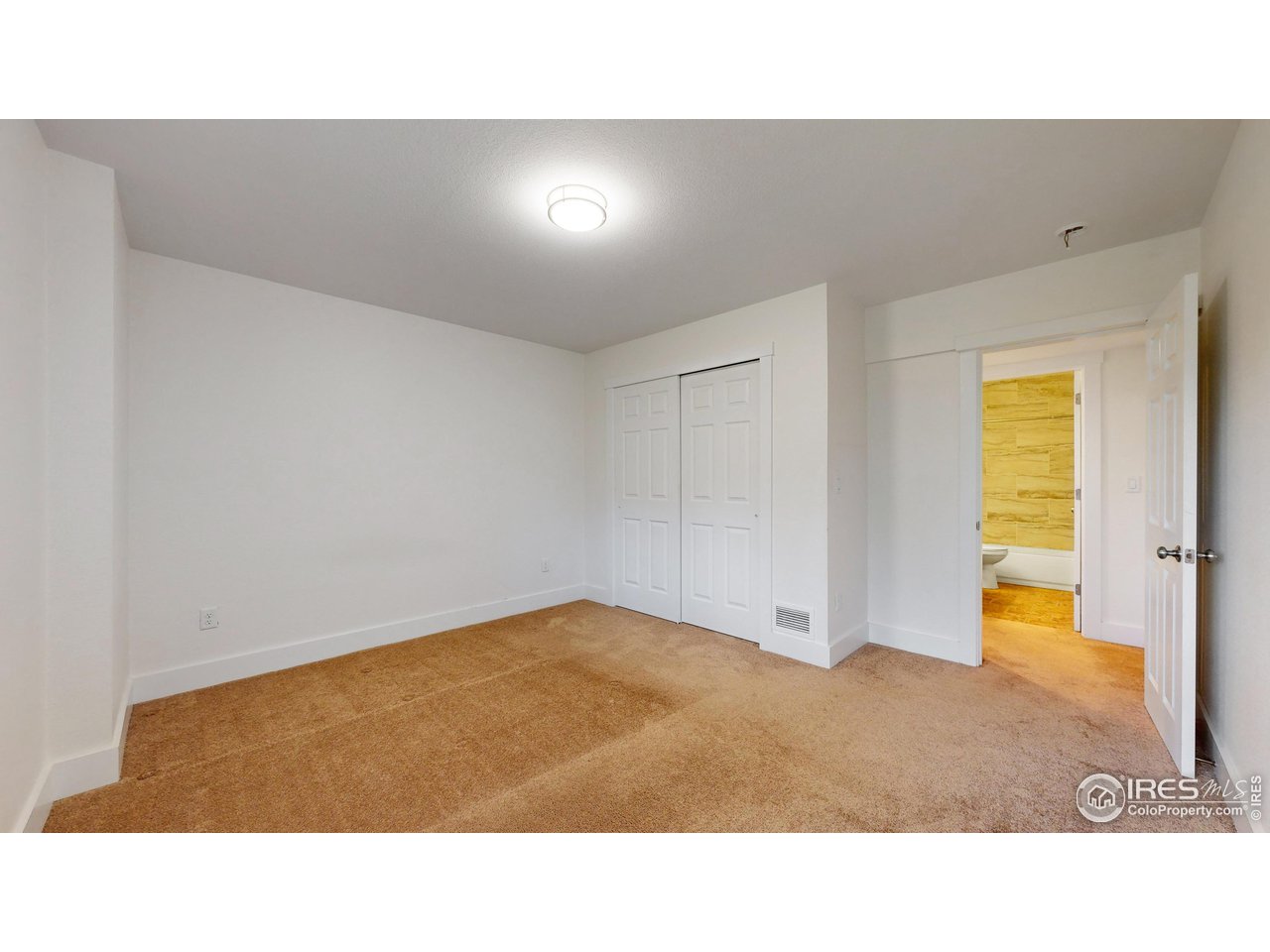 922 Easton Road Lyons, CO 80540 - Photo 19 of 38 Lower Level bedroom