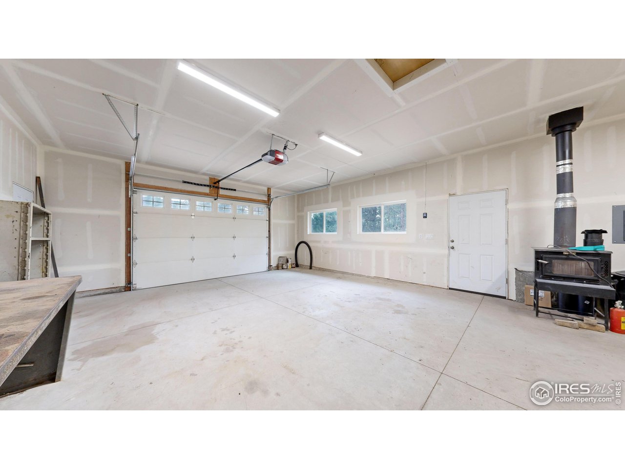 922 Easton Road Lyons, CO 80540 - Photo 24 of 38 Inside Garage/ Workshop