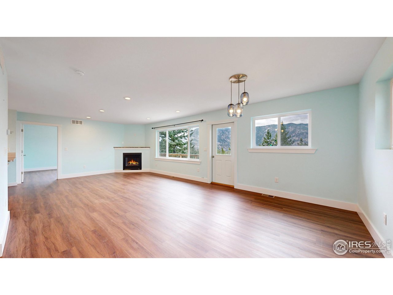 922 Easton Road Lyons, CO 80540 - Photo 3 of 38 Open Living Area - carefree luxury vinyl floors