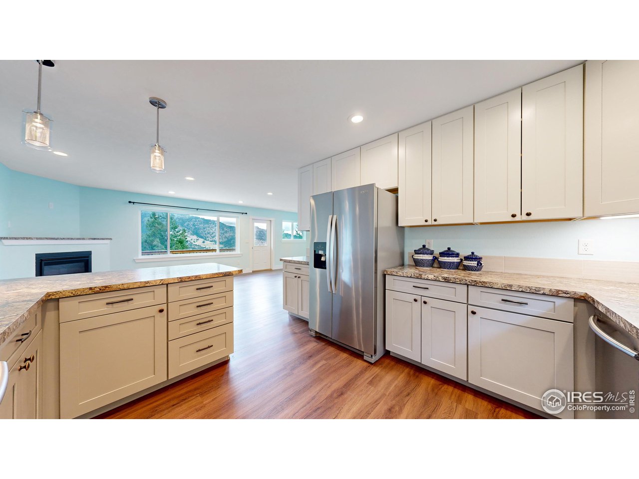 922 Easton Road Lyons, CO 80540 - Photo 5 of 38 Kitchen with modern cabinets and stainless steel appliances