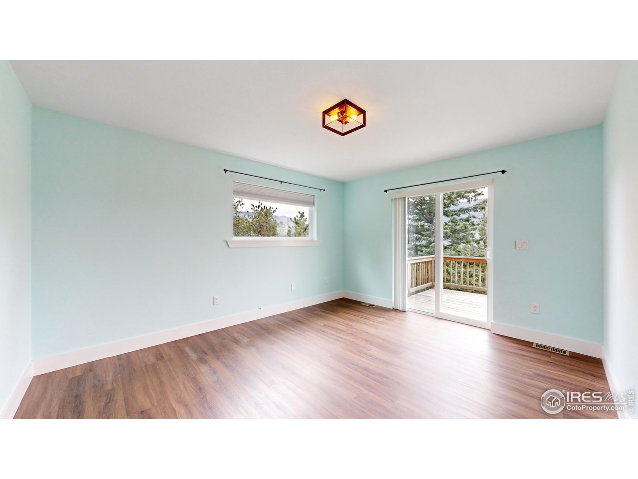922 Easton Road Lyons, CO 80540 - Photo 7 of 38 Access to Balcony from Primary Bedroom