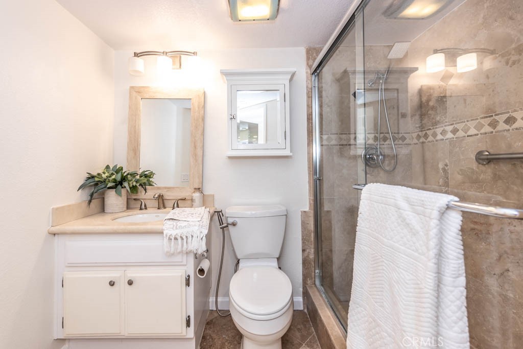 1881 Duncan Way Corona, CA 92881 - Photo 16 of 75 a bathroom with a sink toilet and shower