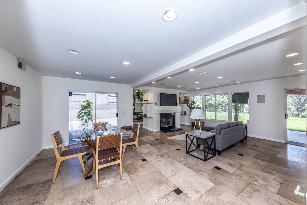 1881 Duncan Way Corona, CA 92881 - Photo 24 of 75 a living room with furniture and a fireplace